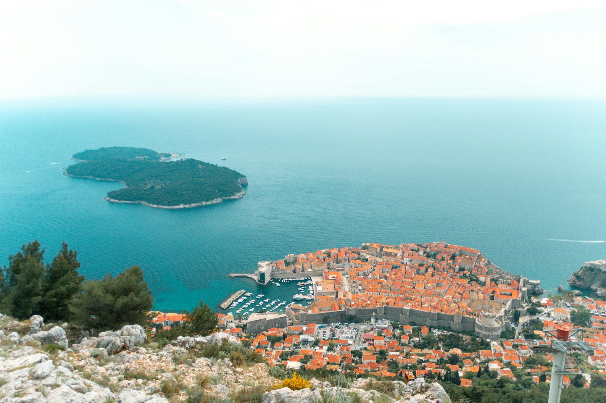 The view from the top of a mountain overlooking the city of dubrovnik